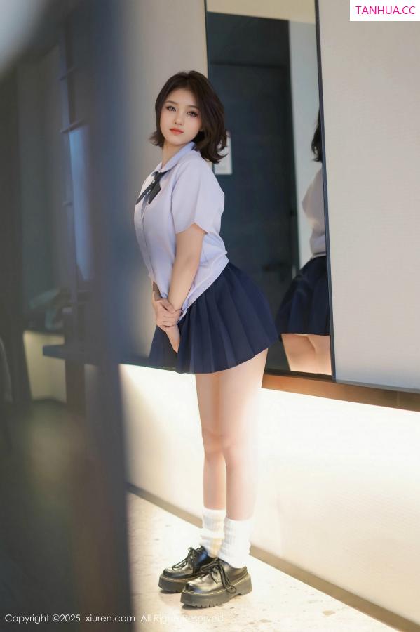   [XiuRen]高清写真图 2025.03.07 No.9985 小橘子orange 美腿性感第21张图片